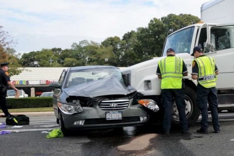 Semi-truck collision scene on highway