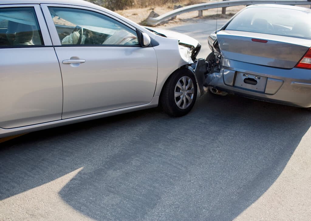 Rear‑end collision scene showing vehicle damage in Kearny Mesa