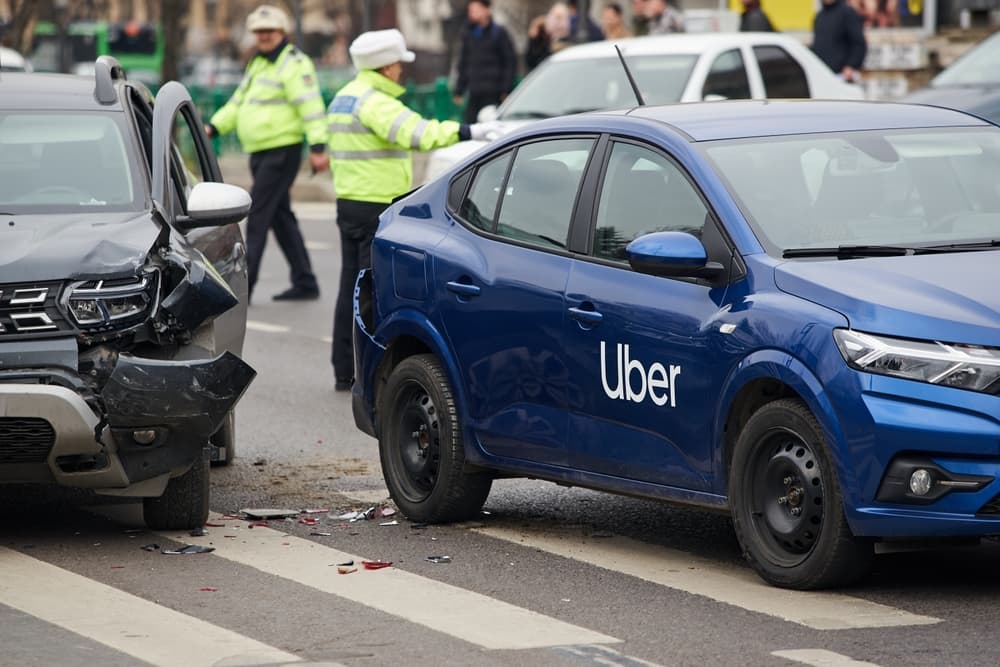 Uber/Lyft car accident with injuries to passengers.