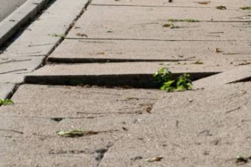 Uneven sidewalk or wet public entryway in Oceanside